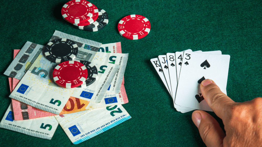 Playing cards ,casino chips and money