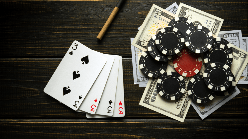 Playing cards, casino chips and money