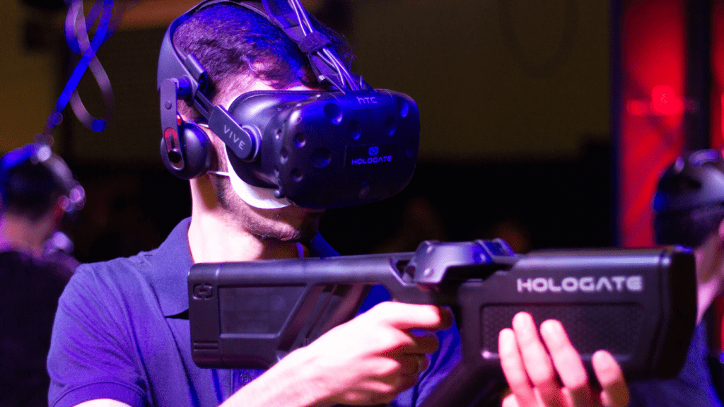 Man wearing VR while playing video game