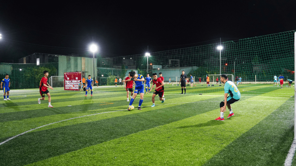 Playing Football in field